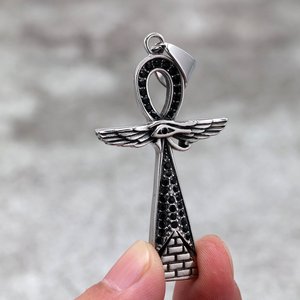 yunnique Pendentif croix Ankh rétro en acier inoxydable de style égyptien ancien avec ailes et motif œil pour hommes et femmes - Product Image 1