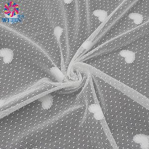 Venta al por mayor 100% fibra de poliéster blanco suave melocotón corazón Dot Jacquard tul Power Mesh tejido de punto ropa de escenario vestido falda hilo - Product Image 1