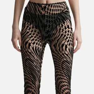 מועדון נשים אלגנטי סקסי לובש מכנסי רשת שקופים למחצה מכנסיים מתלקחים בכל רחבי כוכבים מכנסי סקיני מכנסיים שחורים עם מותן גבוה