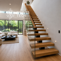 Escalier mono-à-capitère sur mesure, design architectural minimaliste intérieur, fabrication professionnelle et ingénierie