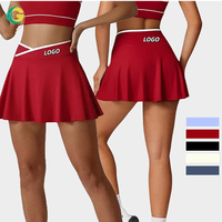 Conjunto Deportivo de 4 Piezas con Bloques de Color: Falda de Tenis de Cintura Cruzada con Pantalones Cortos, Sujetador Deportivo Halter de Alto Soporte con Bolsillos para Gimnasio y Golf