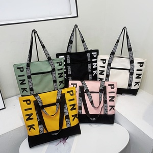 Nouveautés Sacs à main de voyage rose pour femme Logo imprimé personnalisé Grands sacs fourre-tout unis Toile vierge pour femme - Product Image 1