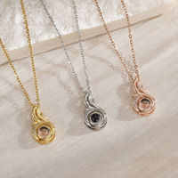 Collier pendentif en cuivre avec pierre de projection micro-incrustée en forme d'animal, 100 langues, design de niche pour femme, style clavicule tendance