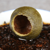 Té Pu'er estilo Court de 2012 con cáscara de mandarina verde, un té que reduce la grasa, adelgaza el abdomen, desintoxica y preserva la salud