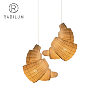 Suspension luminaire moderne en métal et tissu, design créatif en forme de croissant, style Wabi Sabi, pour café, restaurant, salle à manger, vente en gros usine