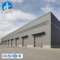 Atelier en structure acier préfabriquée de précision avec conception multi-entrées, entrepôt PEB prêt à l'installation