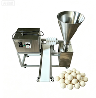 Machine automatique de production et de transformation de boules de pâte spirales et de snacks fourrés pour boulangerie