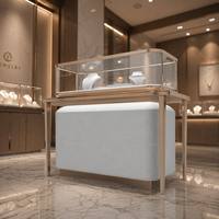 Table de présentation de bijoux incurvée de luxe, support en or rose, vitrine anti-poussière en verre pour collier de diamants, bague, mobilier de boutique