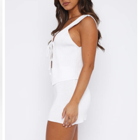 Ensemble 2 pièces personnalisé pour femme : Crop top sans manches à nouer devant et mini-jupe moulante, idéal pour les soirées d'été et les clubs