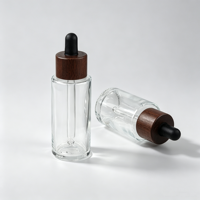 Flacon compte-gouttes en verre givré cylindrique avec bouchon compte-gouttes en bois, logo personnalisé, plusieurs capacités pour l'emballage de sérum de soin de la peau