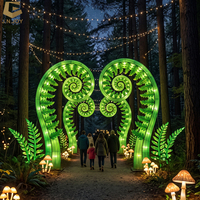 Installation de lanternes de jardin bioluminescentes, affichage lumineux des insectes pour jardin botanique, expérience lumineuse immersive nocturne