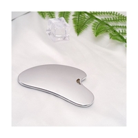Outil de massage facial en acier inoxydable en forme de cœur HZ pour la relaxation myofasciale et le soin raffermissant de la peau