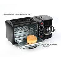 Four à petit-déjeuner électrique tout-en-un 3-en-1 en plastique pour chauffer la viande d'oeufs frits à la vapeur Four-grille-pain transfrontalier Utilisation