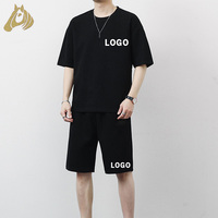 Ensemble de T-shirts à manches courtes surdimensionnés, respirants, avec logo personnalisé, couleur unie, fabriqués en Chine