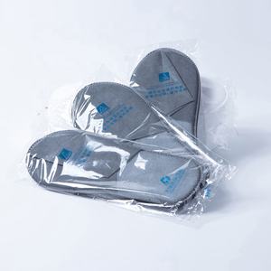 Pantoufles d'hôtel jetables en tissu non tissé de spa blanc personnalisé 100% dégradables et antidérapantes - Product Image 6