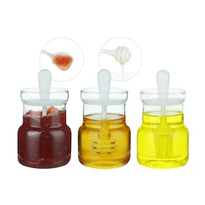 Vasetti di vetro olio più venduti contenitori di vetro con cucchiaio olio pennello vetro miele barattolo Dispenser
