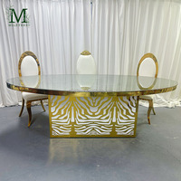 Meubles de mariage d'hôtel, table de réception moderne, cadre en acier inoxydable doré, plateau en verre miroir ovale, table de mariage