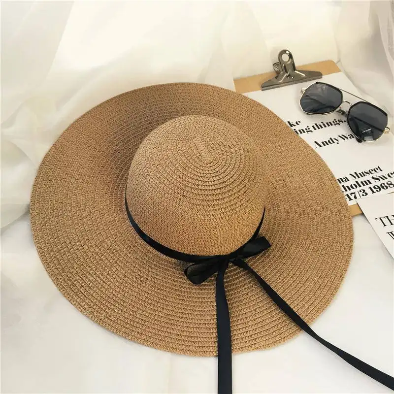 2023 Hot Sale Runde Raffia Strohhüte mit breiter Krempe Summer Sun Hats für Frauen
