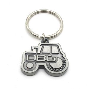 Llavero Metálico Personalizado 2D con Diseño de Logotipo de Empresa de Vehículos en Relieve y Acabado Antiguo - Product Image 1