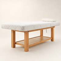 Lit de massage en bois robuste pour la vente en gros, avec matelas matelassé de 0,35 m³ et trou facial, idéal pour cliniques et hôtels