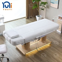 Lit de beauté électrique blanc à 4 moteurs, chauffant et réglable, pour soins du visage et massage, avec base dorée LED pour salon