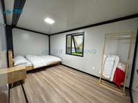 Rumah Mungil Siap Kirim 30ft Rumah Kontainer Prefabrikasi yang Dapat Diperluas Panel Sandwich Baja/Kayu Desain Modern Penggunaan Luar Ruangan untuk Sekolah