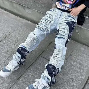 Huili Groothandel Custom Ripped Denim Jeans Bad Guy Stijl Patched Werkte Wijde Pijpen Ripped Gestapeld Jeans Mannen Flare