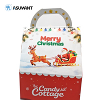 Boîte cadeau en papier personnalisée en forme de maison de Noël avec poignée, boîte d'emballage pour bonbons, biscuits, pommes imprimée avec Père Noël et rennes