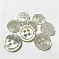 Boutons en nacre blanche naturelle à 4 trous, de haute qualité, nouveau design fantaisie, double face, pour vêtements