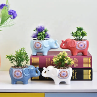 Pot de fleur en céramique émaillée en forme de petit éléphant mignon pour la maison et le jardin en gros