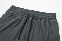 Vente en gros de shorts de course courts athlétiques solides pour hommes pour l'entraînement, jogging, gym, fitness, sport, taille élastique