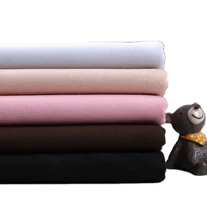 Shaoxing वस्त्र थोक 8 OZ 10 OZ सादे बुना लच्छेदार कैनवास सूती कपड़े निविड़ अंधकार कपड़े के लिए कैनवास Weekender बैग