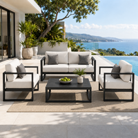 Ensemble de meubles de terrasse modernes pour l'extérieur, structure en métal, canapé de jardin avec coussins et table basse