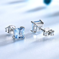 Tren mode baru tipe geometris S925 perak bertatahkan biru safir 5A zircon desain niche anting-anting bunga