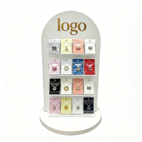 Support de présentation d'accessoires pour boucles d'oreilles en acrylique personnalisé avec plusieurs étagères et base ronde pour comptoir de magasin de détail