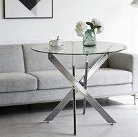 Table à manger moderne et élégante avec plateau en verre trempé rond et pieds croisés chromés pour la maison, le salon, la cuisine, l'hôtel
