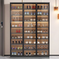 Meuble à chaussures moderne avec porte en verre pour entrée, unité de rangement modulaire élégante avec finition noire élégante et cadre en bois