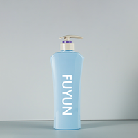 Fuyun Bouteille de shampoing PET bleu mat de luxe 550ml avec pompe à lotion verte Bouteille de lotion cosmétique personnalisée pour blush