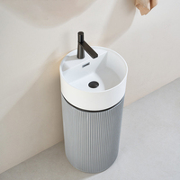 Meuble-lavabo moderne sur pied en bois avec petit lavabo intégré et rangement pour salle de bain