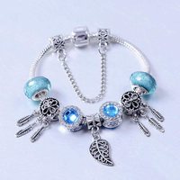 Bracelet en alliage doré avec perles de cristal, opale, attrape-rêves et feuille ajourée pour femme et couple