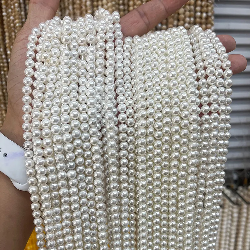 Venta al por mayor 2-20MM color deslumbrante 7A perla de concha Natural fuera de cuentas blancas redondas sueltas espaciador cuentas para la fabricación de joyas