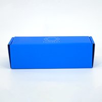 Caja de Cartón Corrugado con Lámina Azul Personalizada para Camisetas, Embalaje para Envío de Ropa, Proveedor Especializado en Embalaje Personalizado para Marcas de Ropa