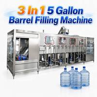 Machine de remplissage et de bouchage automatique 3-en-1 pour bouteilles d'eau minérale pure de 20 L, haute précision, 450 BPH