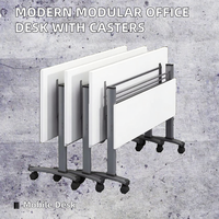 Bureau d'écriture modulaire moderne, élégant et fonctionnel, avec panneaux et roulettes incluses pour un gain de place, idéal pour l'école, le bureau ou la salle de formation.