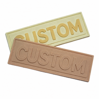 Logo de marque en relief personnalisé, étiquette en Pvc 3d souple, patchs en caoutchouc pour vêtement, vente en gros