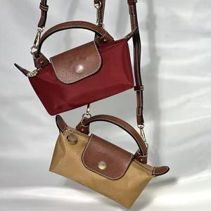 Sac à bandoulière Longchamp de marque française, nouveau modèle à poignée courte, en nylon imperméable, style dumpling, pour femme, vente en gros - Product Image 1