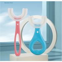 Brosse à dents pour bébé Tête de brosse en silicone en forme de U Nettoyage des dents pour enfants de 2 à 12 ans