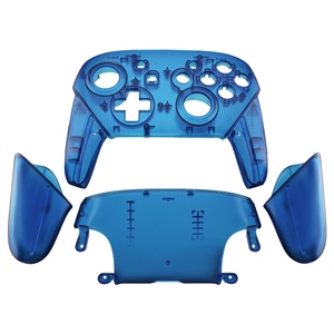 EXtremeRate Coque de remplacement complète transparente bleue avec poignées pour manette Switch Pro - Product Image 1