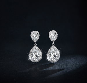 Boucles d'oreilles de créateur en argent avec moissanite VVS en forme de poire 6x9mm 2 carats - Product Image 2