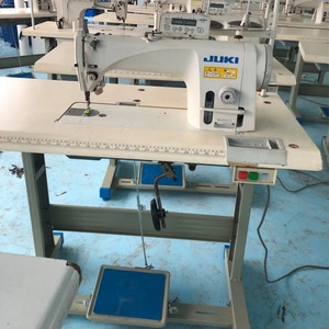 Machine à coudre industrielle à point droit DDL-9000B robuste d'occasion, fonctionnement stable, machine à coudre plate pour usage en usine - Product Image 2